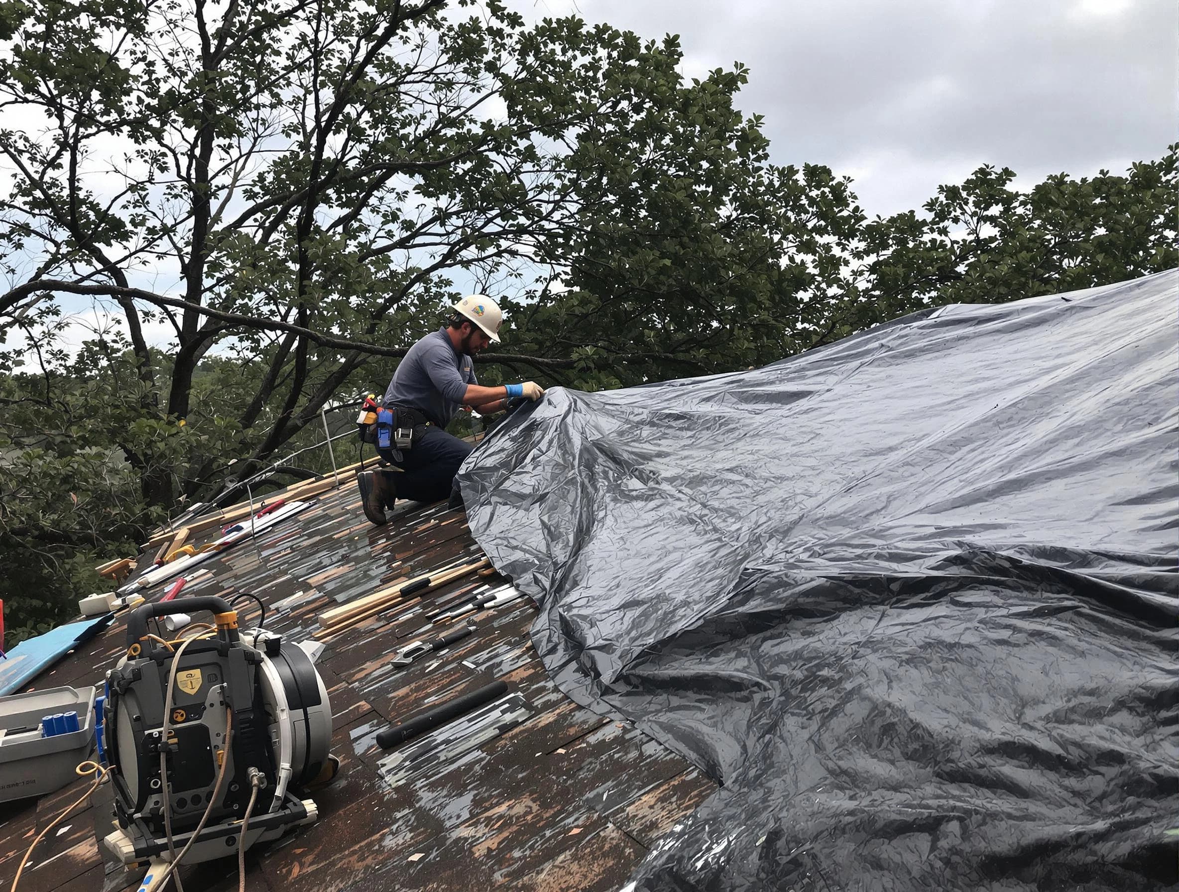 Kent Roofing Company responding to an emergency roof repair call in Kent, OH